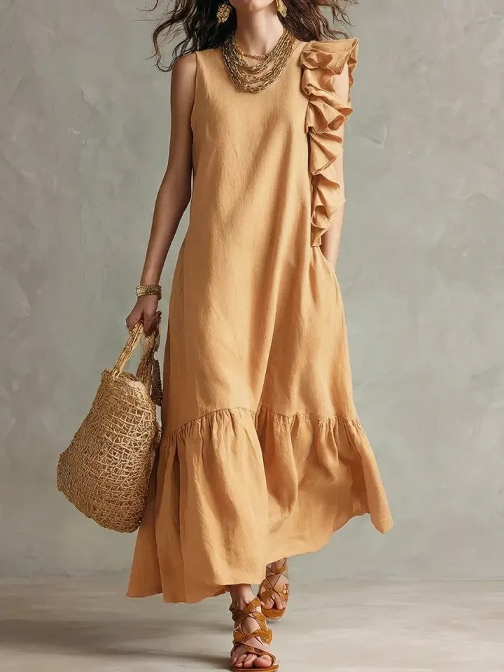Vestido de silueta fluida con volantes y diseño asimétrico