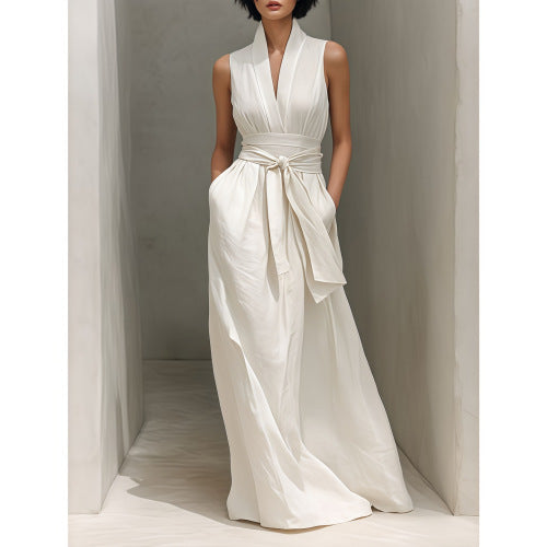 Vestido largo de caída amplia con escote en V y ajuste en cintura