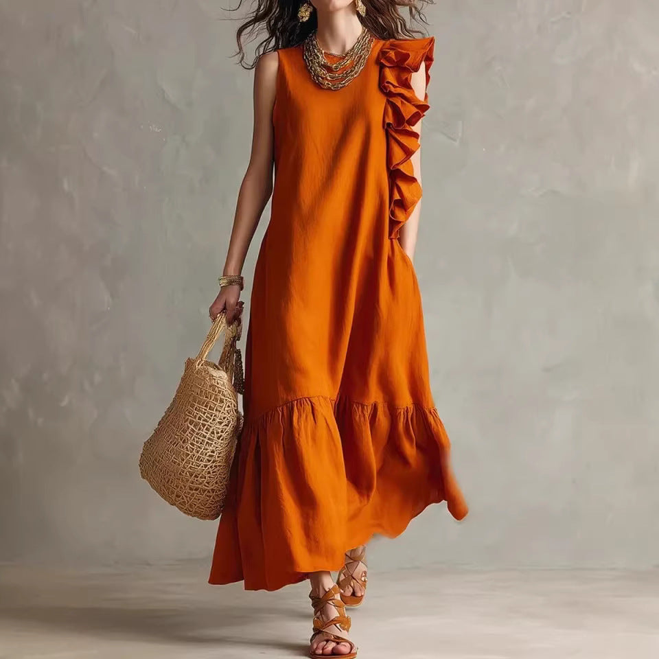 Vestido de silueta fluida con volantes y diseño asimétrico